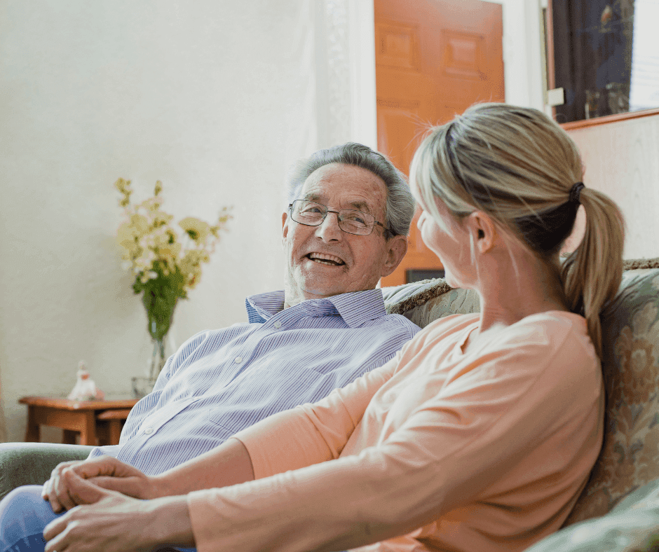Elderly man and daughter.png