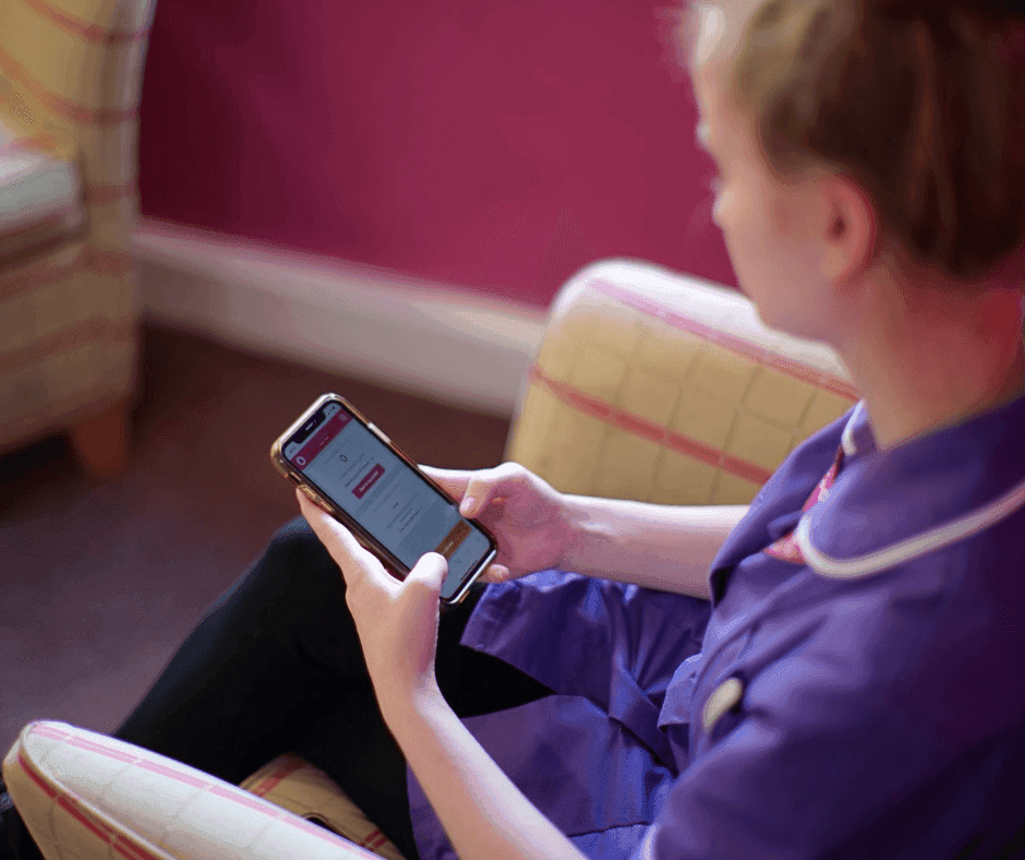 Carer looking at her phone