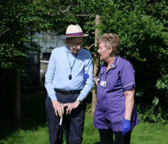 Mobile Header - male service user outside with carer.png